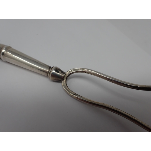 270 - An ebonised Toasting Fork with silver mounts, London 1995