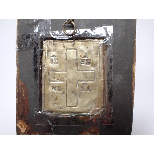 275 - An Orthodox brass Icon of apostle holding a book, reverse incised Christian cross with characters in... 