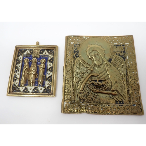 276 - A 19th Century Orthodox brass Icon of angel cradling baby Jesus, traces of black and white enamel re... 