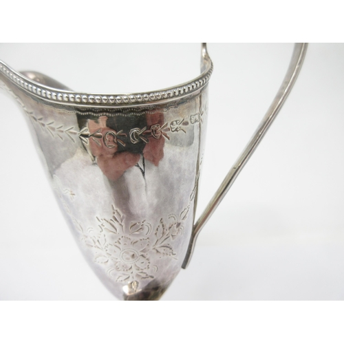 3 - A George III silver helmet shape Cream Jug engraved floral swags, initials in cartouche, beaded rim ... 