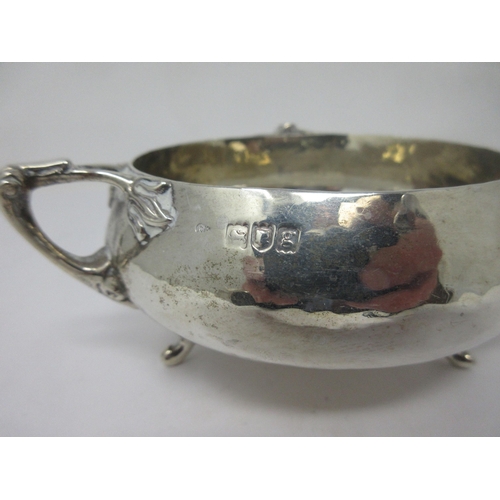 34 - An Edward VII silver Art Nouveau three handled Bowl, London 1902