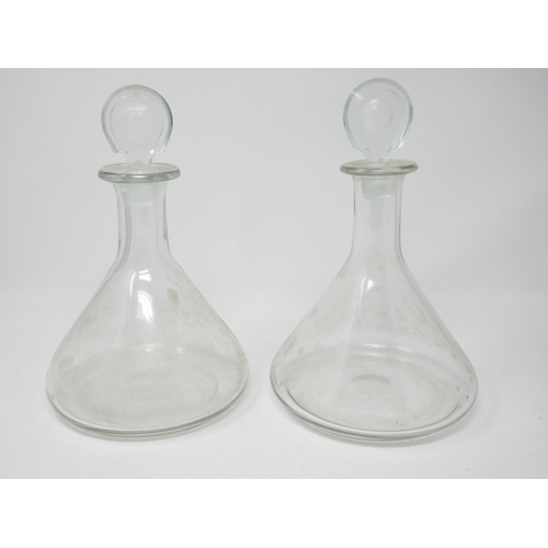 342 - A pair of plain glass Ship's Decanters with bull's eye stoppers