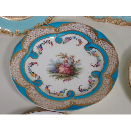 343 - A pair of Royal Worcester Plates with gilt storks, butterflies and water lillies, made for Mortlock'... 