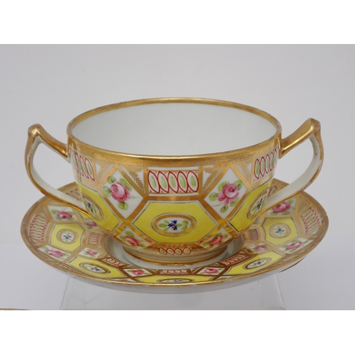 347 - A Coalport two handled Cup and Saucer with gilt borders, pink rose and other floral panels on yellow... 