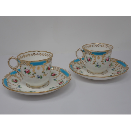 349 - A pair of Minton porcelain Cups and Saucers painted pink roses with gilt border, a Minton Coffee Cup... 