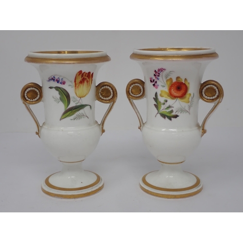 356 - A pair of two handled Vases painted flowers in a basket, pink roses and tulips, scroll handles, in t... 