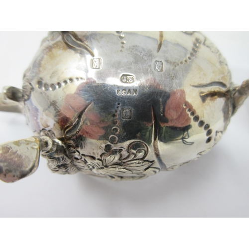 36 - An Edward VII Irish silver Jug and Sugar Bowl embossed birds, dolphins and animals on lion mask supp... 