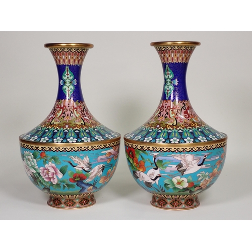 369 - A pair of club-shaped baluster Cloisonne Vases with floral and geometric design to upper section, ha... 