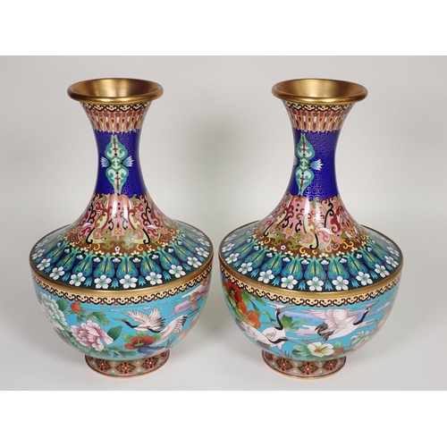 369 - A pair of club-shaped baluster Cloisonne Vases with floral and geometric design to upper section, ha... 