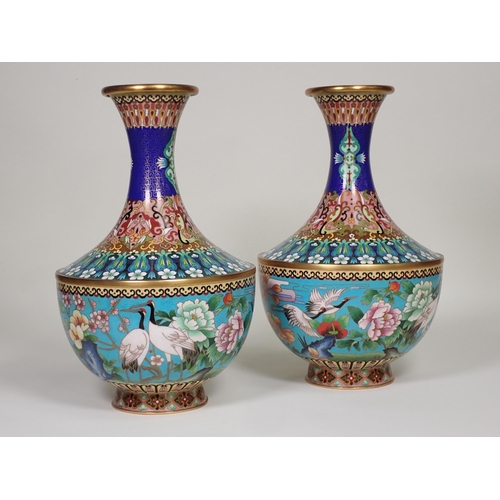 369 - A pair of club-shaped baluster Cloisonne Vases with floral and geometric design to upper section, ha... 