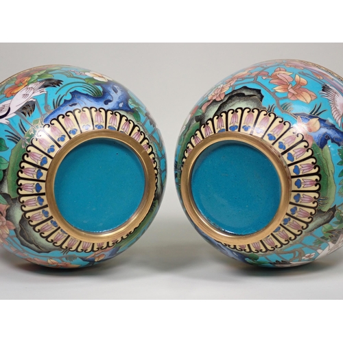 369 - A pair of club-shaped baluster Cloisonne Vases with floral and geometric design to upper section, ha... 