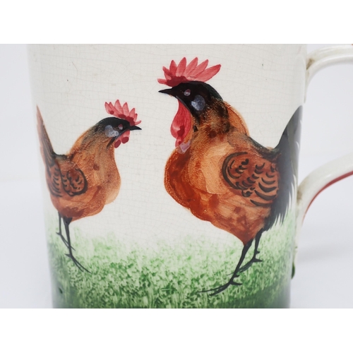 381 - A Weymss Ware large Mug decorated Chickens, the underside with impressed Wemyss Ware mark and oval T... 