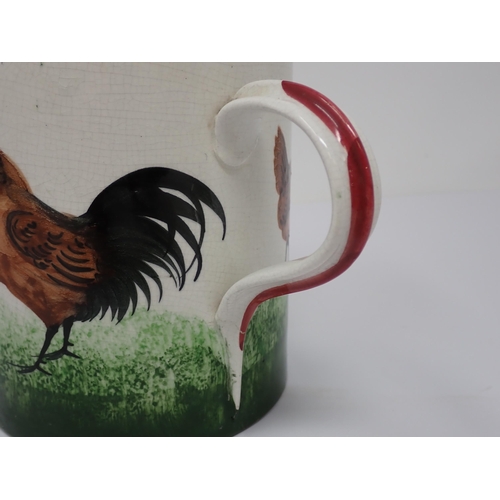 381 - A Weymss Ware large Mug decorated Chickens, the underside with impressed Wemyss Ware mark and oval T... 