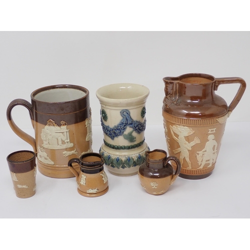 382 - A collection of Doulton Lambeth Stoneware, including Loving Cup, Mug, Jugs, miniature items, some A/... 