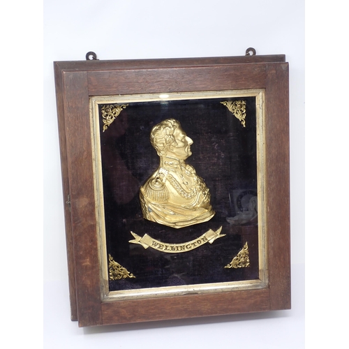 399 - A framed and glazed gilt metal relief portrait of Wellington, overall 17 x 15in