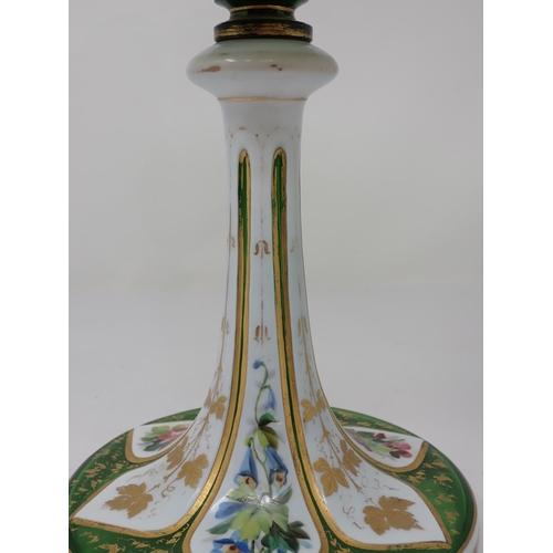 403 - A Bohemian glass Chalice Vase painted alternating panels of sprays of flowers with flowers and gildi... 