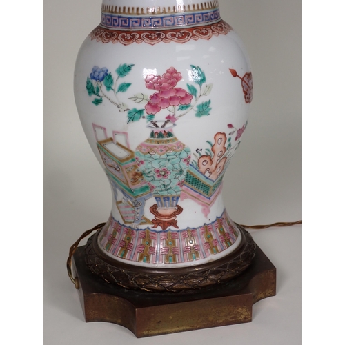 413 - A Chinese Vase with famille rose enamels, scenes of urns and flowers with decorative bands and ormol... 