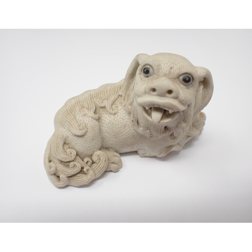 419 - A Chinese pottery Dog of Fo and ball on plinth, 7in high A/F, a small ceramic recumbent Dog of Fo, 3... 