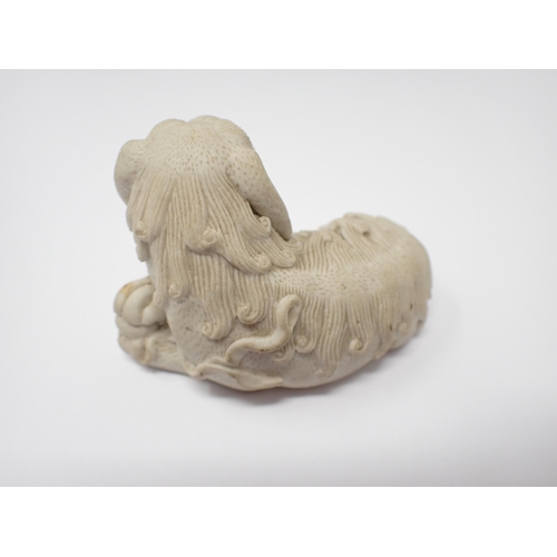 419 - A Chinese pottery Dog of Fo and ball on plinth, 7in high A/F, a small ceramic recumbent Dog of Fo, 3... 