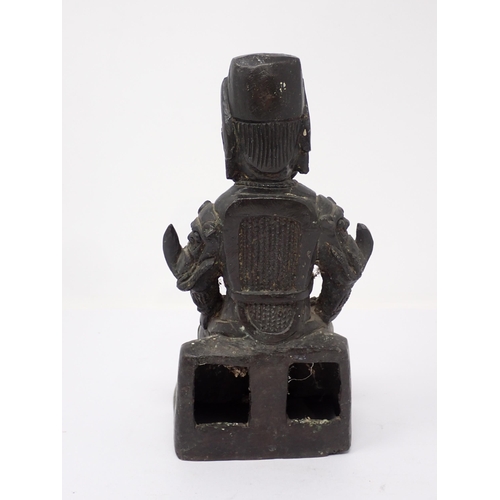 421 - A bronze of a seated Chinese warrior, 8in H