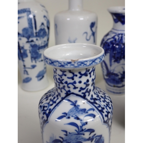 425 - A collection of 19th Century Chinese blue and white Vases, including a pair with panels of vases, 7½... 