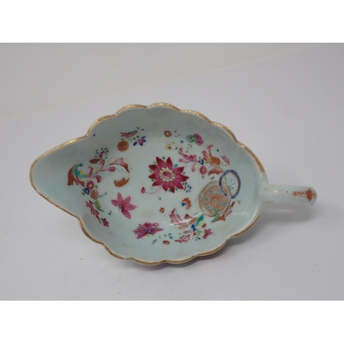 437 - A Chinese famille rose Sauceboat painted flowers in coloured enamels 7 1/2in, hairline crack