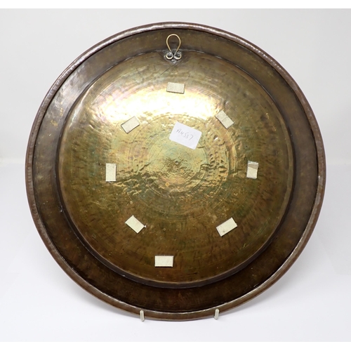 442 - An early 20th Century Syrian brass Charger inlaid script in silver and copper, 13 1/2in diameter