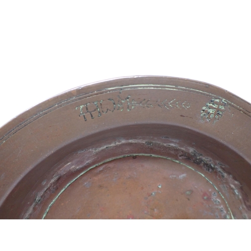 443 - An Orthodox copper Offertory Dish bearing characters to top and underside of rim, 8in diameter