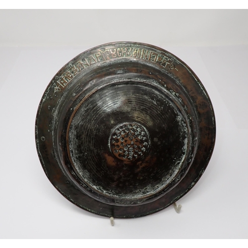 443 - An Orthodox copper Offertory Dish bearing characters to top and underside of rim, 8in diameter