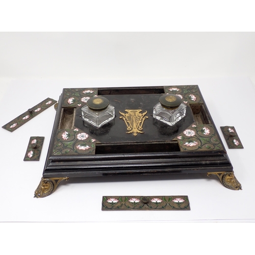 449 - A Victorian ebonised and enamel Inkstand with two inset glass inkwells, the brass covers stamped 'Pa... 