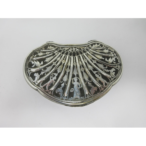 46 - A Georgian silver and tortoiseshell Snuff Box of kidney shape decorated figures, birds and leafage A... 
