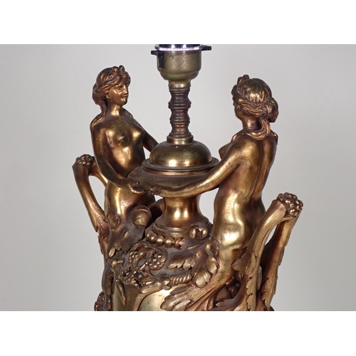 460 - A bronze two handled Table Lamp with figures holding bowl, the handles with leafage, rope twist and ... 