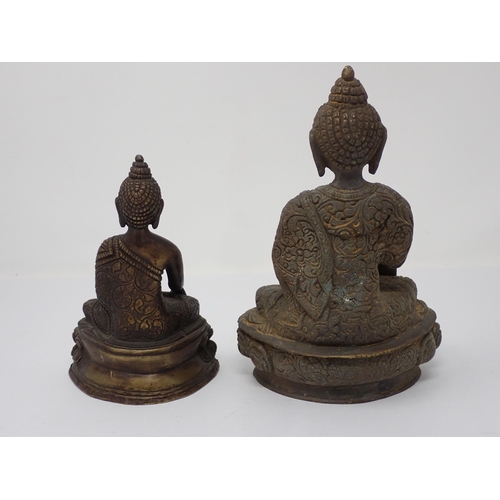 476 - Two bronze seated Buddhas, 7 1/2 and 6in H