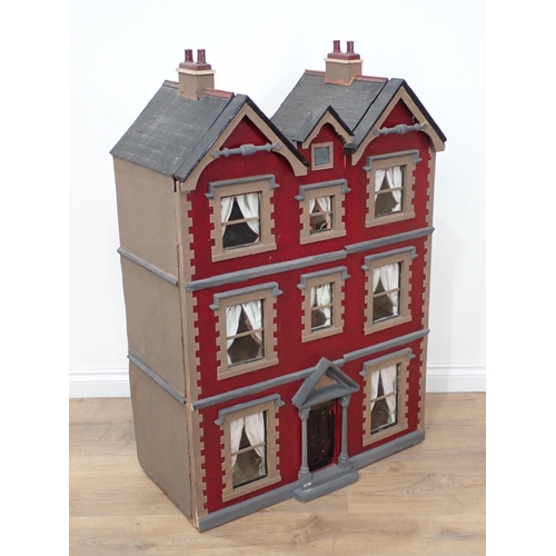 483 - An Art Nouveau Doll's House with unusual triple gable roof, the front opening in two sections to rev... 