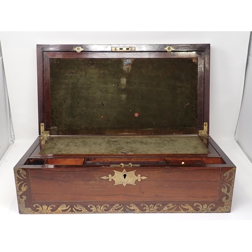 485 - A 19th Century rosewood and brass inlaid Writing Box opening up to a sloped writing surface with com... 