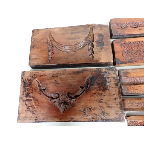 497 - A collection of ten 19th Century Plaster Moulds including; swags, frames, etc mostly box wood