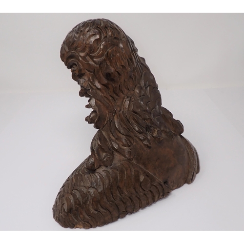 499 - A finely carved wooden Bust, possibly of John the Baptist, with fleece over right shoulder, possibly... 