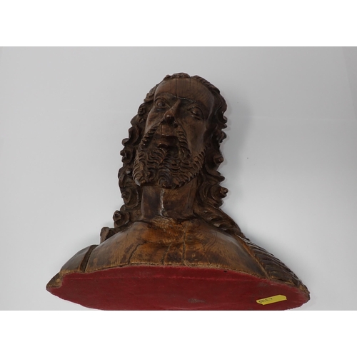 499 - A finely carved wooden Bust, possibly of John the Baptist, with fleece over right shoulder, possibly... 