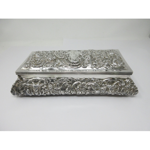 5 - An Edward VII silver Casket embossed masks and floral scrolls, London 1901, 11 x 5 1/2in, maker: Wm ... 