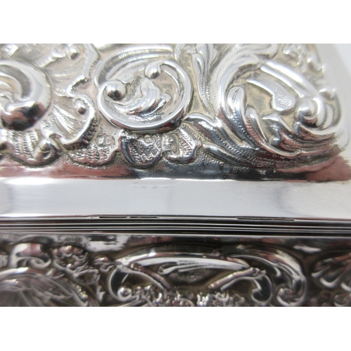 5 - An Edward VII silver Casket embossed masks and floral scrolls, London 1901, 11 x 5 1/2in, maker: Wm ... 