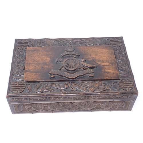 500 - A Kashmir carved Box, the hinged cover with relief carved motif for the Royal Artillery, surrounded ... 