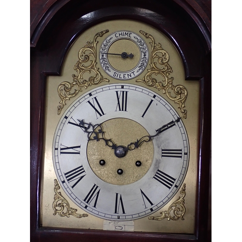 505 - An inlaid mahogany Longcase Clock with arched brass dial, silvered chapter ring, the back of the mov... 