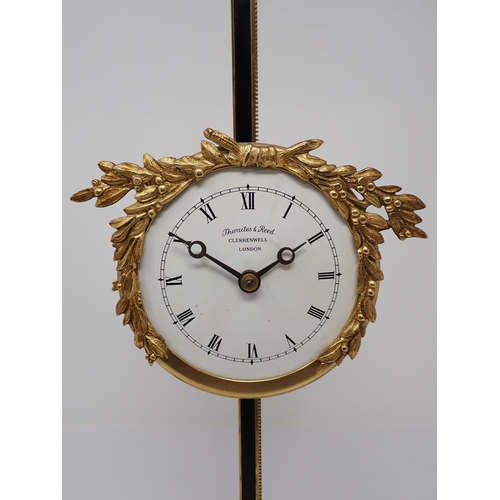 508 - A Thwaites and Reed Rack Clock, 'Ltd Ed, 80 of 500 made in 1973', the circular dial surrounded by gi... 