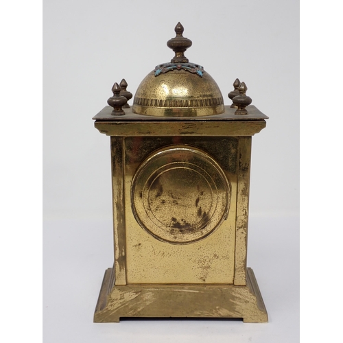 509 - A brass Mantel Timepiece, the domed top with enamel decoration, circular dial (A/F), above an enamel... 