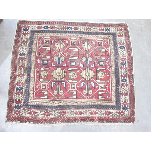 519 - A bordered Shirvan Rug with stylised birds and marks in camel, beige and blue on a red ground, 4ft 2... 