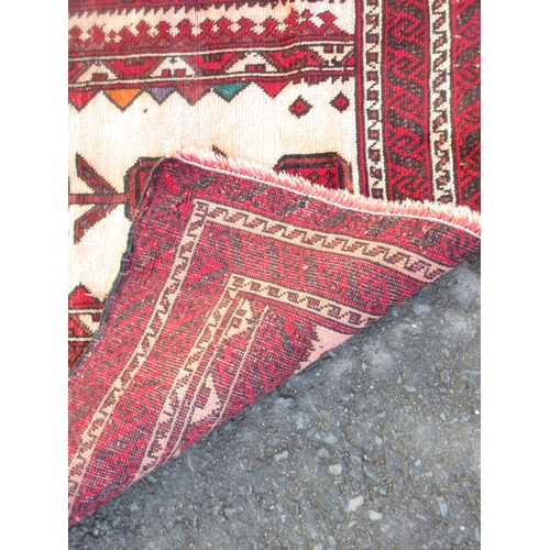 528 - A bordered Turcoman Rug with six guls on a red ground, 5ft x 3ft and a multi-bordered Prayer Rug, th... 