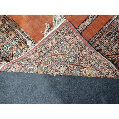 531A - A finely woven Persian Prayer Rug with multi-border design on a red ground, 6ft 4in x 4ft 3in