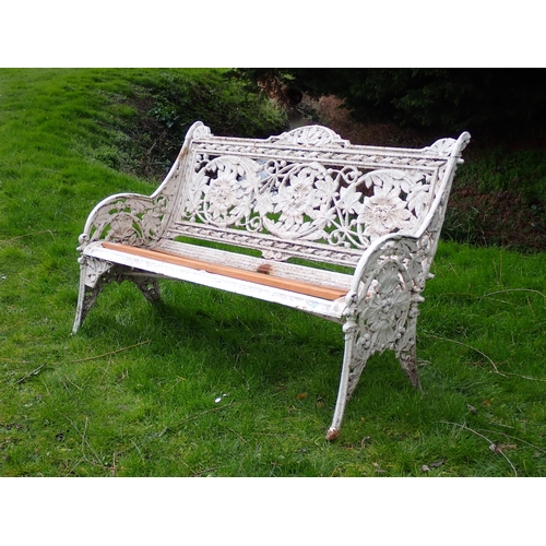 535 - A Coalbrookdale cast iron Garden Bench with arched top and pierced back with chestnut design, replac... 