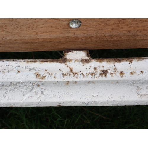 535 - A Coalbrookdale cast iron Garden Bench with arched top and pierced back with chestnut design, replac... 