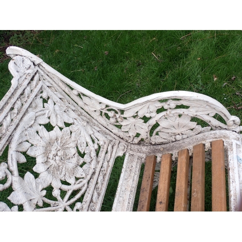 535 - A Coalbrookdale cast iron Garden Bench with arched top and pierced back with chestnut design, replac... 